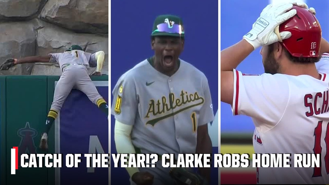 CATCH OF THE YEAR⁉️ Denzel Clarke CLIMBS THE WALL for the HOME RUN ROBBERY 🤯 | ESPN MLB