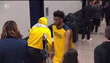 Tyrese Haliburton is on crutches as he greets his teammates in the tunnel following the Game 7 loss