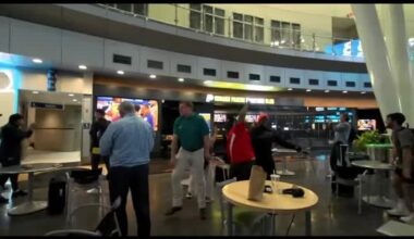Pacers fans at the Indianapolis International Airport react to Tyrese Haliburton’s game-winning shot in Game 1 of the NBA Finals