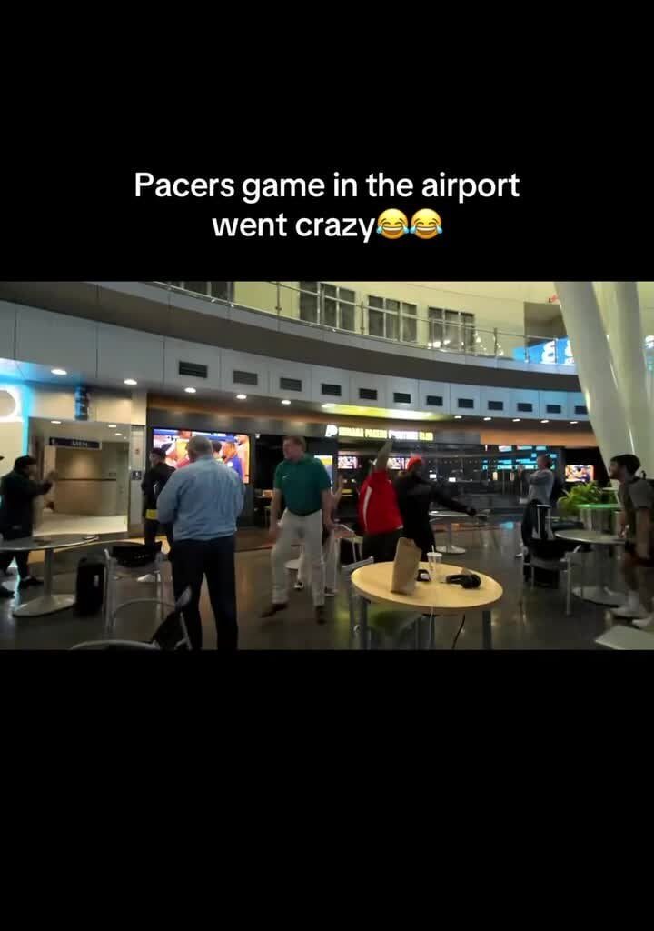 Pacers fans at the Indianapolis International Airport react to Tyrese Haliburton’s game-winning shot in Game 1 of the NBA Finals
