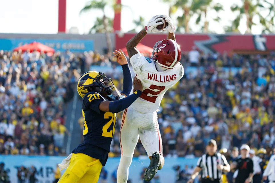 Alabama Crimson Tide wide receiver Ryan Williams (2) makes a catch against the Michigan Wolverines..Matt Pendleton-Imagn Images