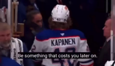 Panther fan empties beer onto Oiler player departing the ice