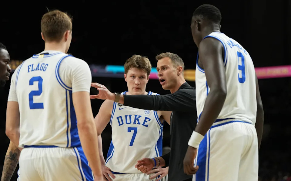 Duke Blue Devils head coach Jon Scheyer talks strategy with his players ahead of the Final Four vs. Houston.Bob Donnan-Imagn Images