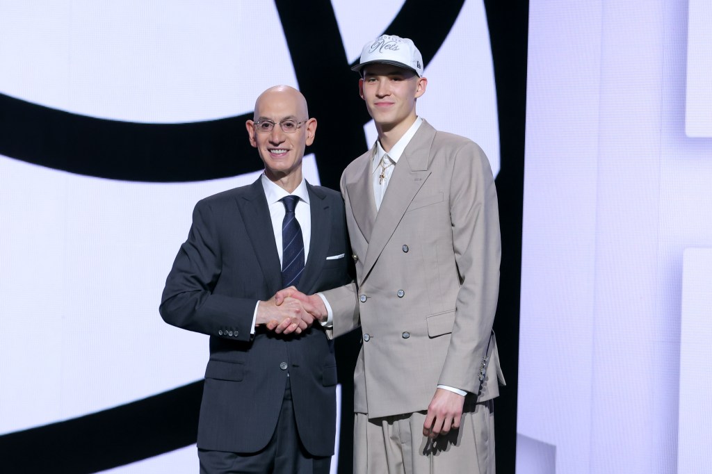 Egor Demin stands with NBA commissioner Adam Silver after being selected as the eighth pick by the Brooklyn Nets in the first round of the 2025 NBA Draft at Barclays Center. 