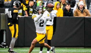Iowa defensive lineman Max Llewellyn sacks Iowa State's Rocco Becht during a September 2024 game.
