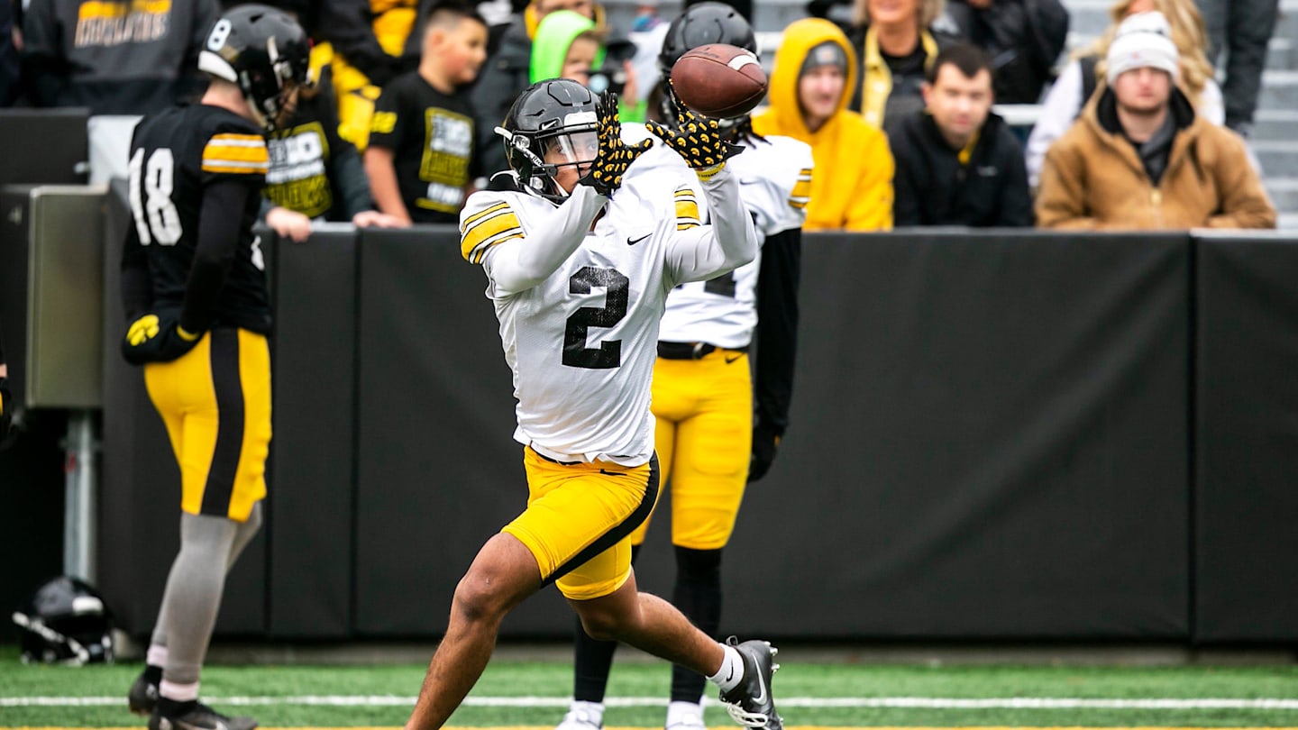 Iowa defensive lineman Max Llewellyn sacks Iowa State's Rocco Becht during a September 2024 game.