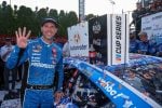 Denny Hamlin, driver of the #11 Progressive Toyota, poses with the winner sticker on his car in victory lane after winning the NASCAR Cup Series AutoTrader EchoPark Automotive 400 at Dover Motor Speedway on July 20, 2025 in Dover, Delaware. (Photo by Meg Oliphant/Getty Images)