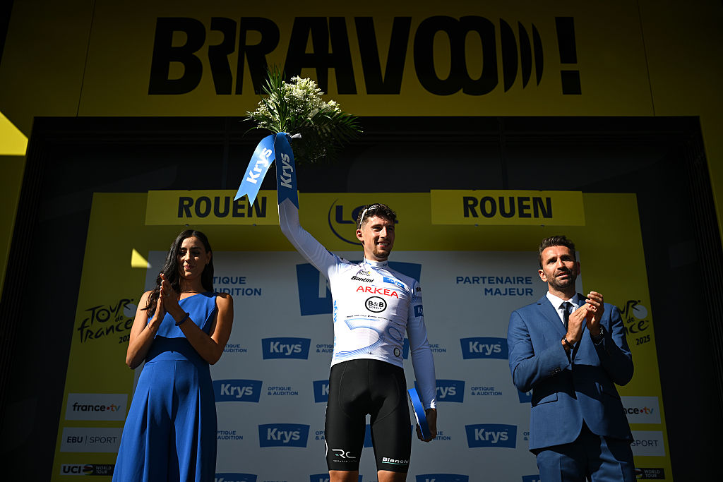 ROUEN, FRANCE - JULY 08: Kevin Vauquelin of France and Team Arkea - B&B Hotels celebrates at podium as White best young jersey winner during the 112th Tour de France, Stage 4 a 174.2km stage from Amiens Metropole to Rouen / #UCIWT / on July 08, 2025 in Rouen, France. (Photo by Dario Belingheri/Getty Images)