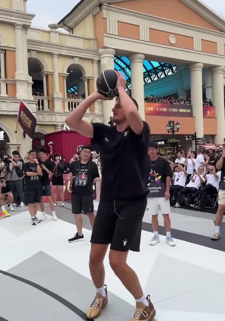 Nikola Jokić shooting competition against his brother Nemanja during a tour in China