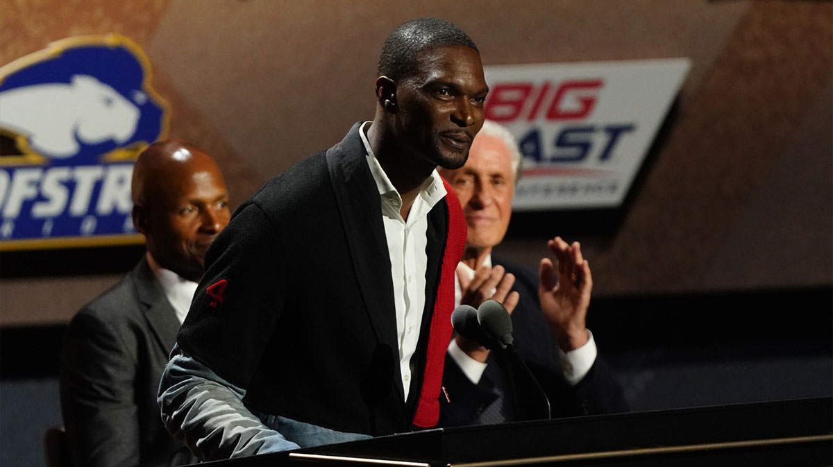 Class of 2021 inductee Chris Bosh speaks alongside presenters Ray Allen and Pat Riley during the Naismith Memorial Basketball Hall of Fame Enshrinement at MassMutual Center.