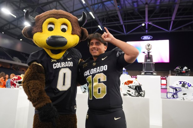 Colorado kicker Alejandro Mata poses for a photo with the team mascot during Big 12 NCAA college football media days in Frisco, Texas, Wednesday, July 9, 2025. (AP Photo/LM Otero)