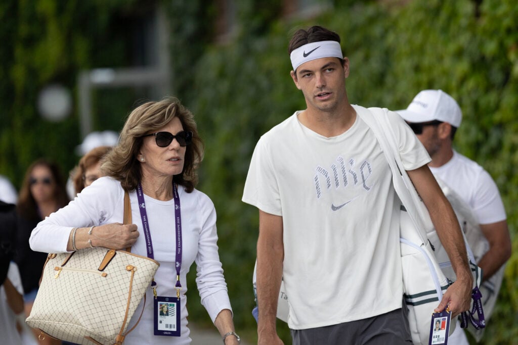 Taylor Fritz of the United States arrives for training with his mother Kathy May in preparation for the Wimbledon Lawn Tennis Championships at the All England Lawn Tennis and Croquet Club.