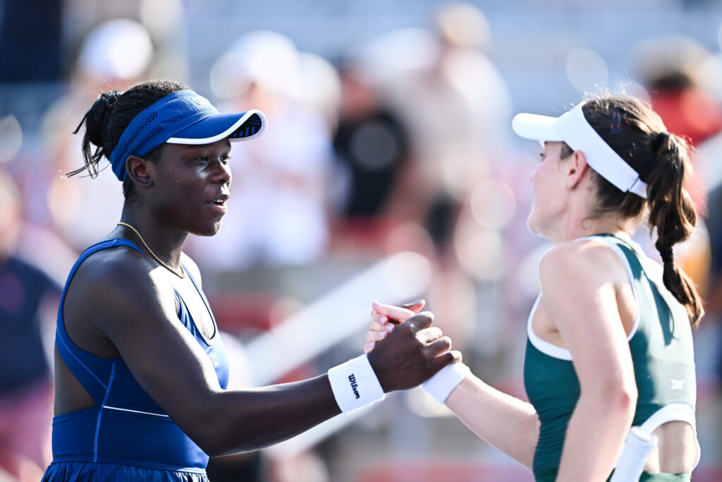 Victoria Mboko of Canada shakes hands with Kimberly Birrell of Australia after their first round match on Day One of the WTA 1000 National Bank Open at IGA Stadium on July 27, 2025 in Montreal, Quebec, Canada.
