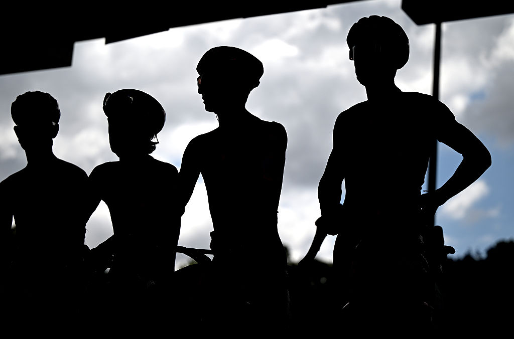 AMIENS, FRANCE - JULY 08: (L-R) Silhouet detailed view of Michael Valgren of Denmark, Neilson Powless of The United States and Ben Healy of Ireland and Team EF Education - EasyPost prior to the 112th Tour de France, Stage 4 a 174.2km stage from Amiens Metropole to Rouen / #UCIWT / on July 08, 2025 in Amiens, France. (Photo by Dario Belingheri/Getty Images)