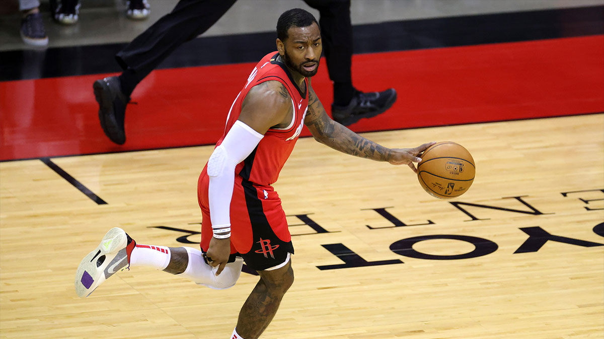 John Wall #1 of the Houston Rockets takes the ball up court during the second quarter of a game against the Los Angeles Lakers at Toyota Center on January 10, 2021 in Houston, Texas.