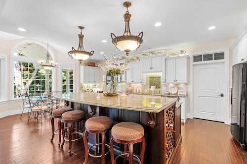 Lush golf course in your backyard in true northern Michigan? This nearly $3.5M luxury home has it all.