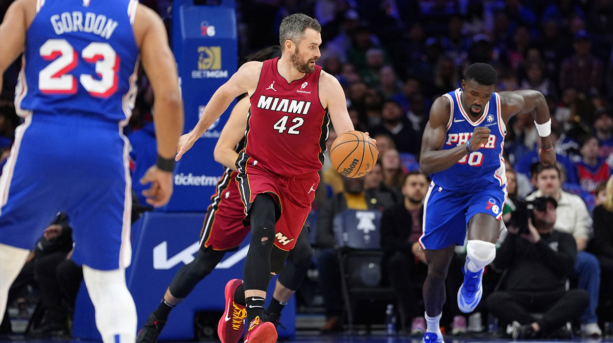 Miami Heat forward Kevin Love (42) drives with the ball against the Philadelphia 76ers in the first quarter at Wells Fargo Center.