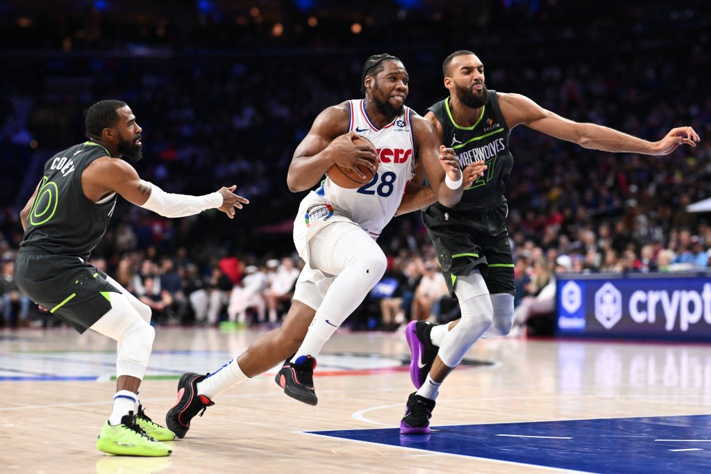 Philadelphia 76ers forward Guerschon Yabusele (28) drives against Minnesota Timberwolves center Rudy Gobert (27) in the second quarter at Wells Fargo Center.