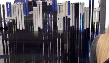 The "Stick Man" Keeps his hand on the stick of their player with the puck.