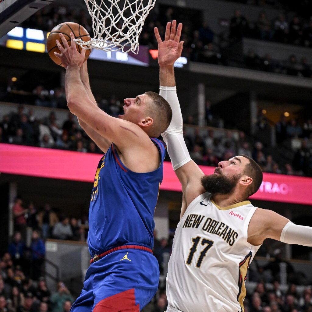Nuggets head coach David Adelman sees Jonas Valanciunas as point center