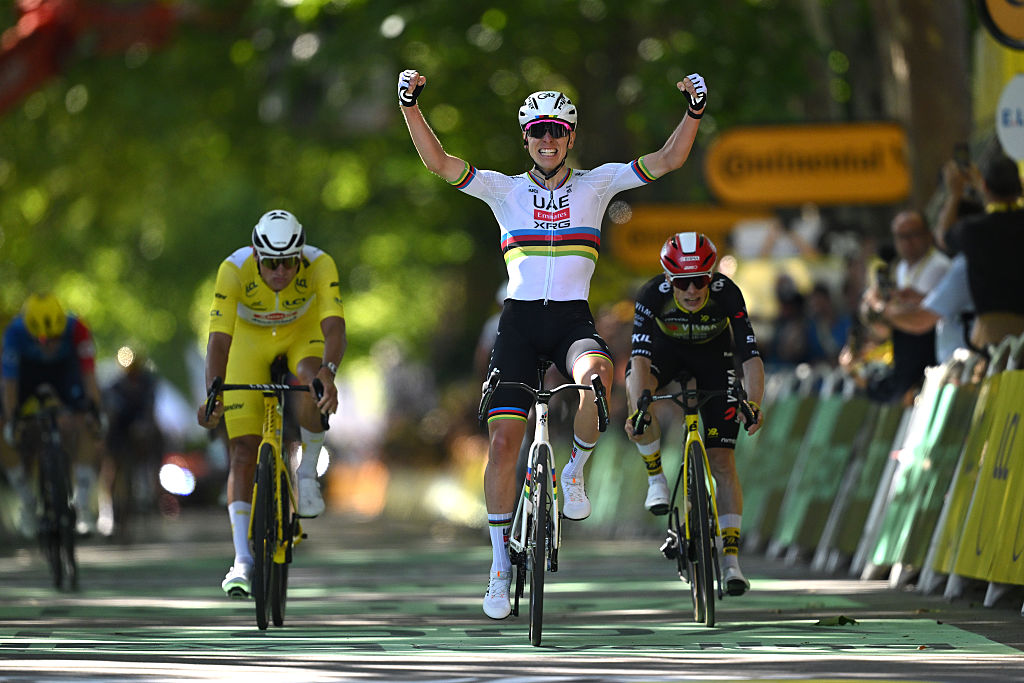 ROUEN, FRANCE - JULY 08: Tadej Pogacar of Slovenia and UAE Team Emirates - XRG (C) celebrates at finish line as stage winner ahead of Mathieu Van Der Poel of Netherlands and Team Alpecin - Deceuninck - Yellow leader jersey (L) and Jonas Vingegaard of Denmark and Team Visma | Lease a Bike (R) during the 112th Tour de France, Stage 4 a 174.2km stage from Amiens Metropole to Rouen / #UCIWT / on July 08, 2025 in Rouen, France. (Photo by Dario Belingheri/Getty Images)