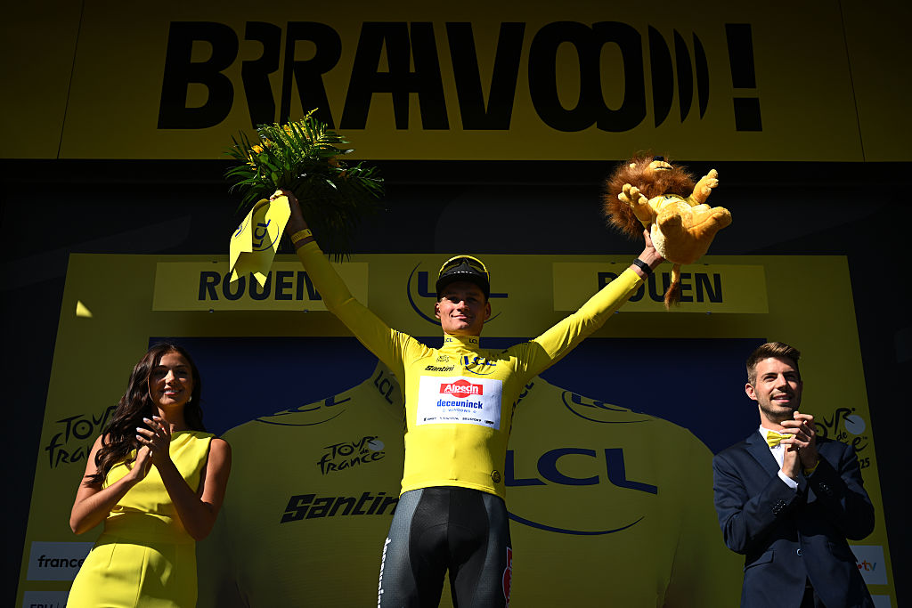 ROUEN, FRANCE - JULY 08: Mathieu Van Der Poel of Netherlands and Team Alpecin - Deceuninck celebrates at podium as Yellow leader jersey winner during the 112th Tour de France, Stage 4 a 174.2km stage from Amiens Metropole to Rouen / #UCIWT / on July 08, 2025 in Rouen, France. (Photo by Dario Belingheri/Getty Images)