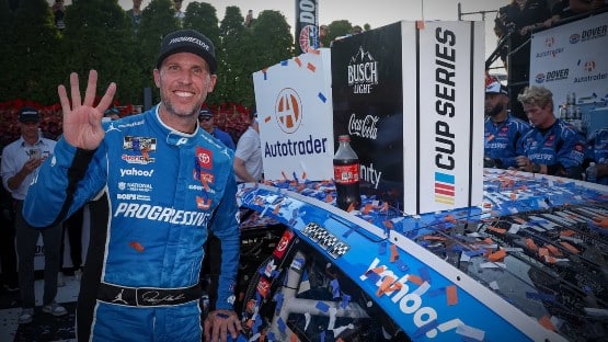 Denny Hamlin, amid NASCAR lawsuit, captures Dover thriller in OT