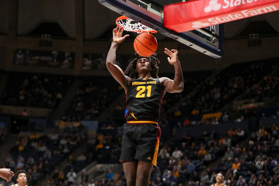 Jan 21, 2025; Morgantown, West Virginia, USA; Arizona State Sun Devils forward Jayden Quaintance (21) dunks the ball during the second half against the West Virginia Mountaineers at WVU Coliseum. Mandatory Credit: Ben Queen-Imagn Images © Ben Queen-Imagn Images