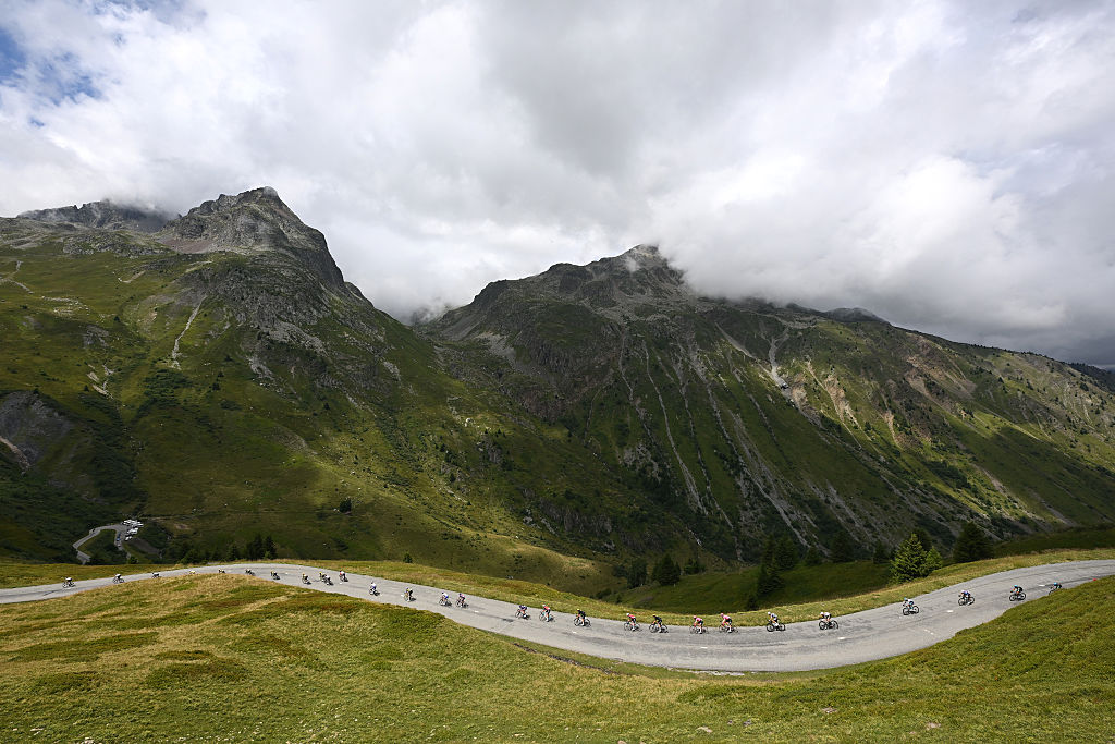 COURCHEVEL - COL DE LA LOZE, FRANCE - JULY 24: A general view of the peloton climbing to the Col du Glandon (1924m) during the 112th Tour de France 2025, Stage 18 a 171.5km stage from Vif to Courchevel - Col de la Loze 2298m / #UCIWT / on July 24, 2025 in Courchevel - Col de la Loze, France. (Photo by Tim de Waele/Getty Images)