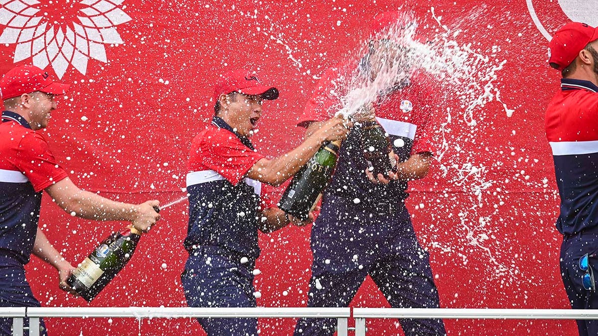 Collin Morikawa champagne