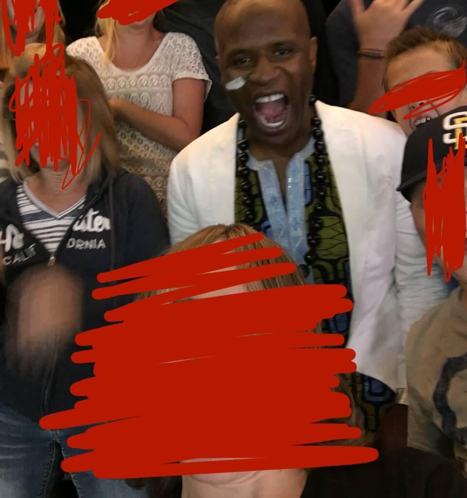 July 16th, 2016 I took a photo with this person who performed at the game. Can anyone let me know who he is? I think i remember the announcers saying that he had 500k followers on something.