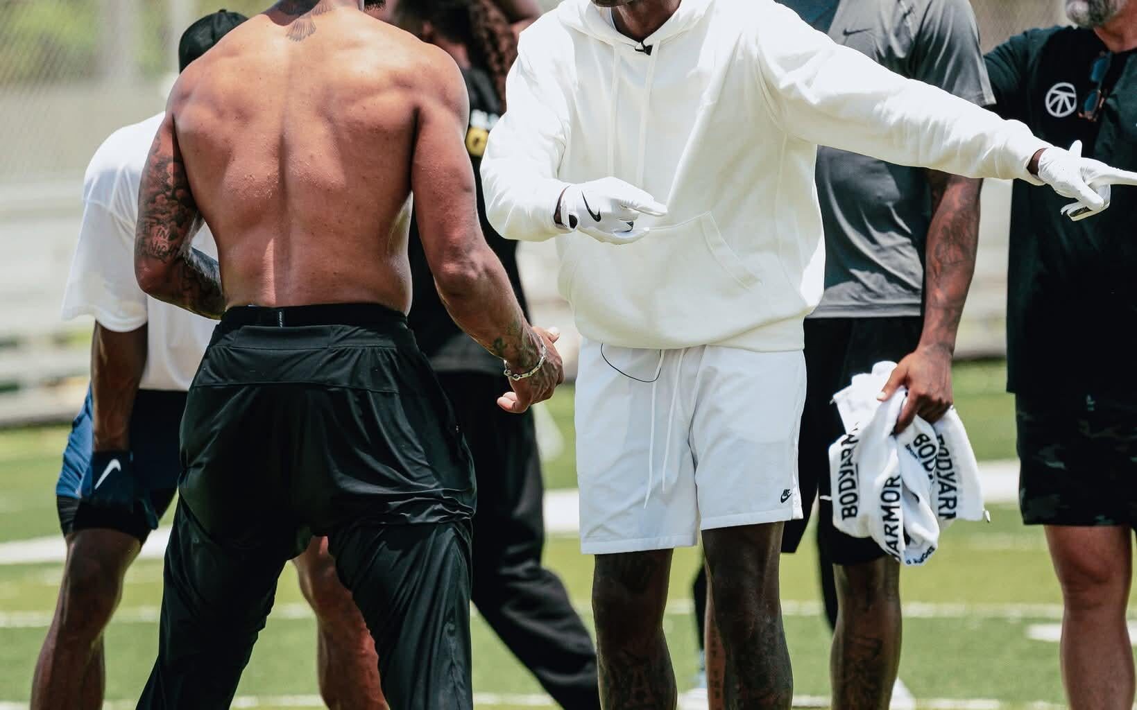 Getting a little help from Ocho at practice.