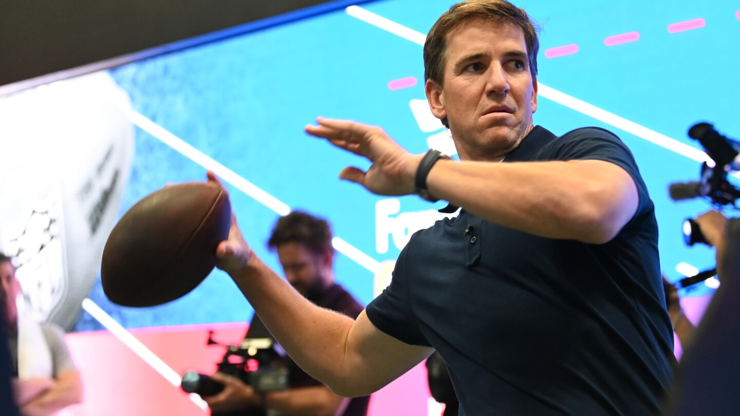 Eli Manning taps out of buying a piece of the Giants, calling it "too expensive"