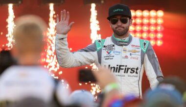 NASCAR Cup Series driver Chase Elliott (right) stands with his father and former driver Bill Elliott (left) prior to the AAA Drive for Autism at Dover International Speedway.