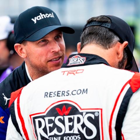 Three-time New Hampshire Motor Speedway NASCAR Cup Series race winner Denny Hamlin (left) and 2017 NASCAR Cup Series champion Martin Truex Jr. (right) chat on pit road prior to the start of the NASCAR Cup Series race at “The Magic Mile” on June 23, 2024.