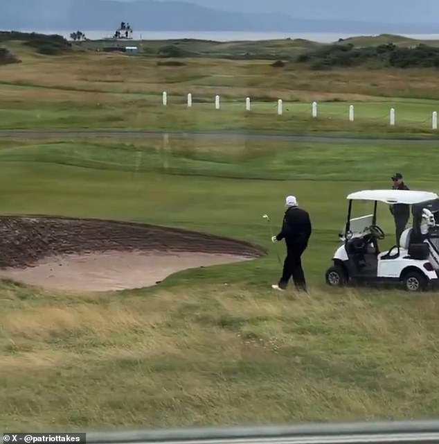 Trump then got out of his golf cart and approached the ball with club in hand