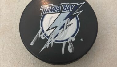 Signed puck