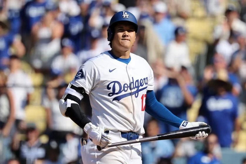 Dodgers star Shohei Ohtani reacts after striking out with the bases loaded against Toronto at Dodger Stadium.