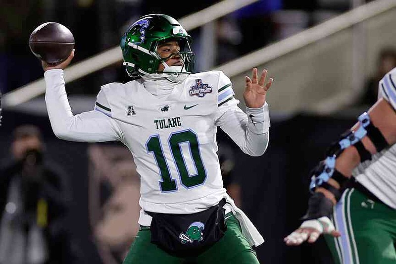 FILE - Tulane quarterback Darian Mensah (10), who has since transferred to Duke, throws a pass during the first half of the American Athletic Conference championship NCAA college football game against Army, Friday, Dec. 6, 2024, in West Point, N.Y. (AP Photo/Adam Hunger, File)