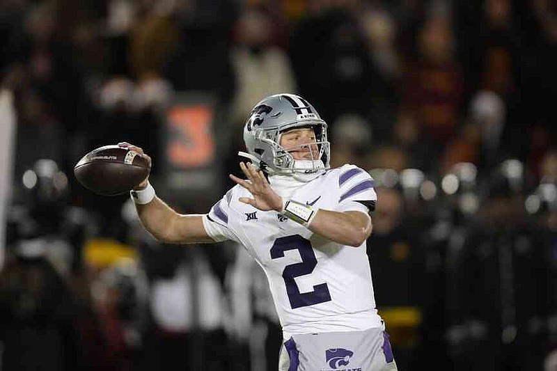 FILE - Kansas State quarterback Avery Johnson throws a pass during the first half of an NCAA college football game against Iowa State on Nov. 30, 2024, in Ames, Iowa. (AP Photo/Charlie Neibergall, File)
