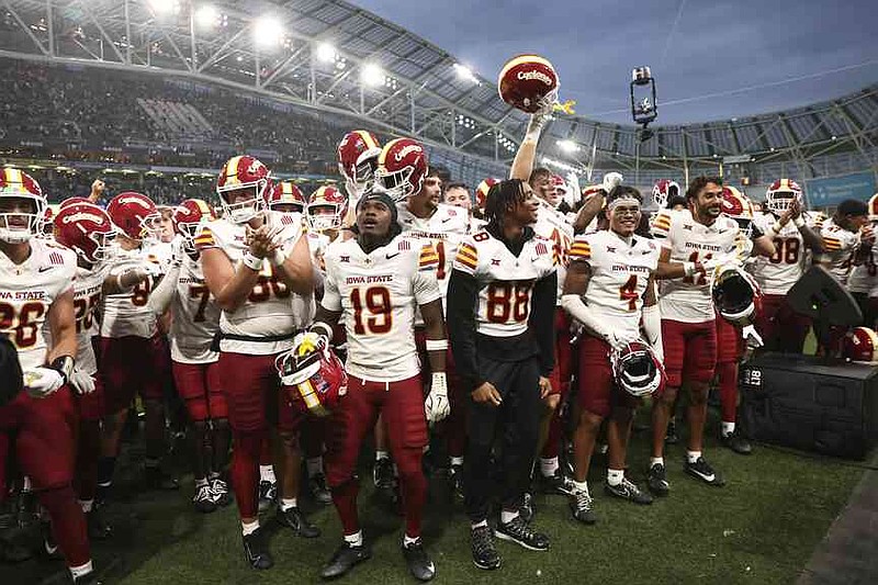Iowa State players celebrate after winning an NCAA college football game between Iowa State and Kansas State in Dublin, Ireland Saturday, Aug. 23, 2025. (AP Photo/Peter Morrison)
