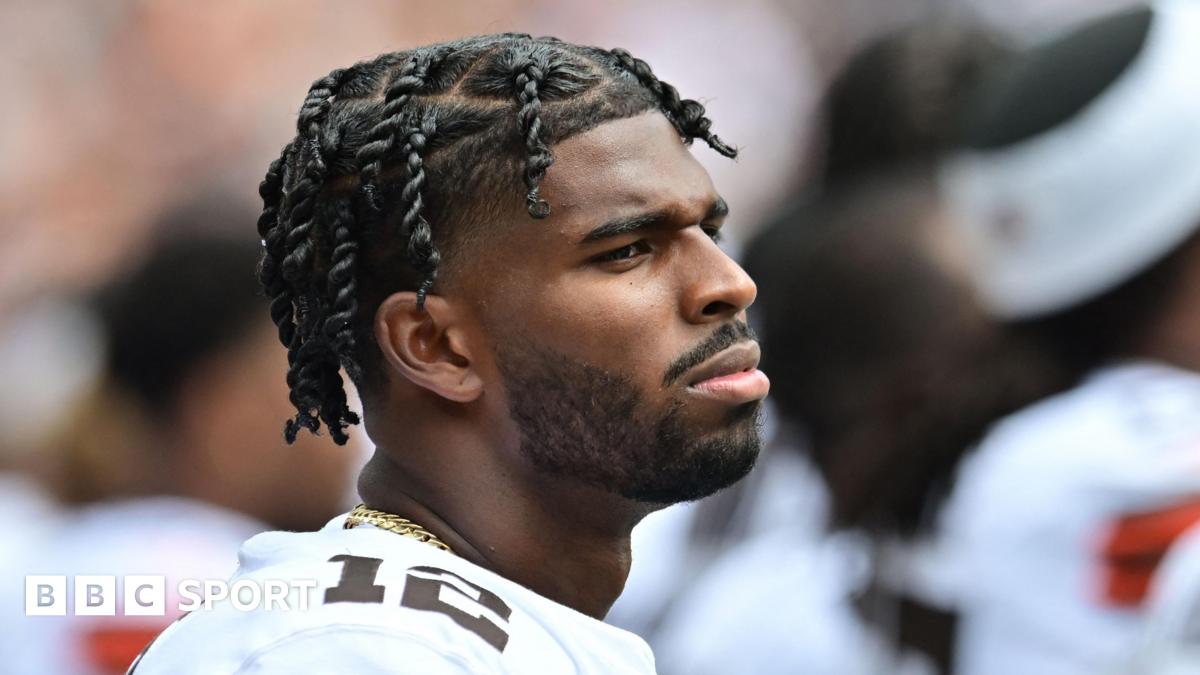 Quarterback Shedeur Sanders listens to the national anthem before the Cleveland Browns' pre-season game against the Los Angeles Rams in 2025