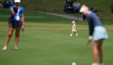 A child walks across a fairway during an April tournament in Texas.