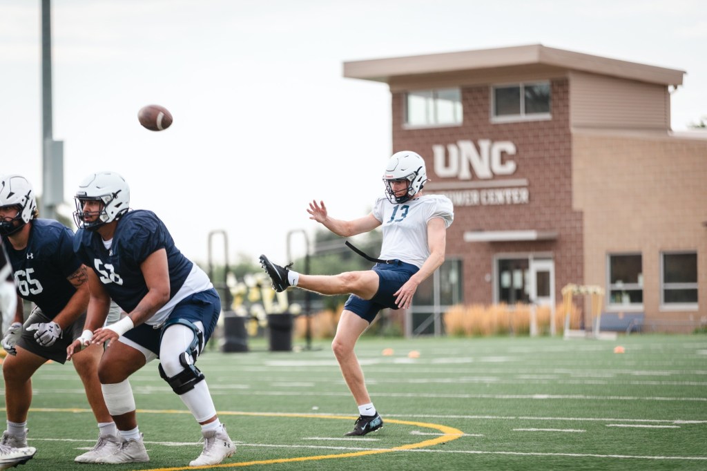 Leo Blumentritt punting for UNC football