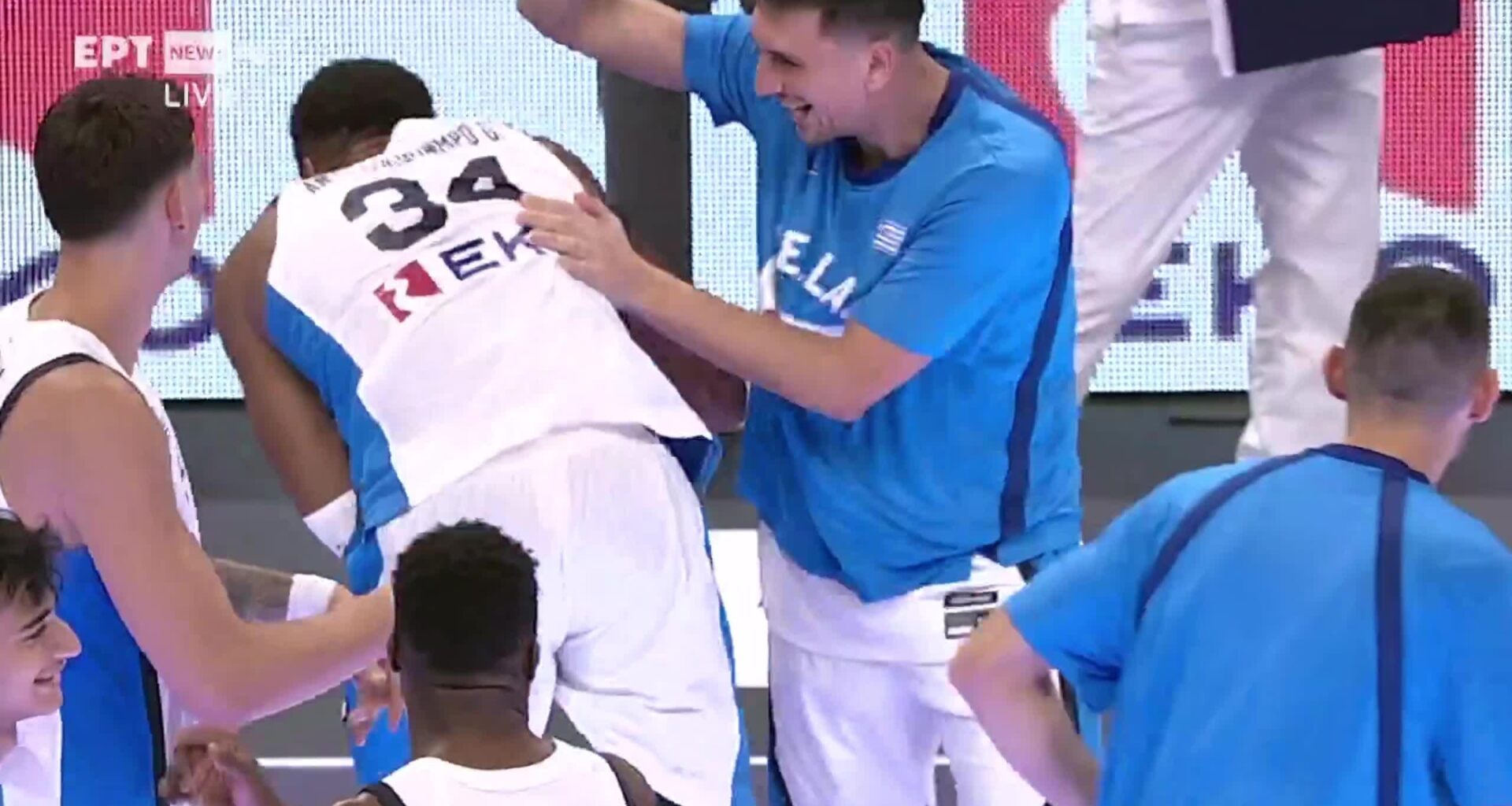 The Greek player that was smacked by Giannis a couple of days ago, takes his revenge during Greece's post-game huddle