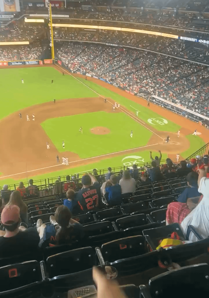 [Lowlight] Astros fan runs out onto the field at Daikin Park, gets all the way up to the pitcher’s mound before  being tackled by security.