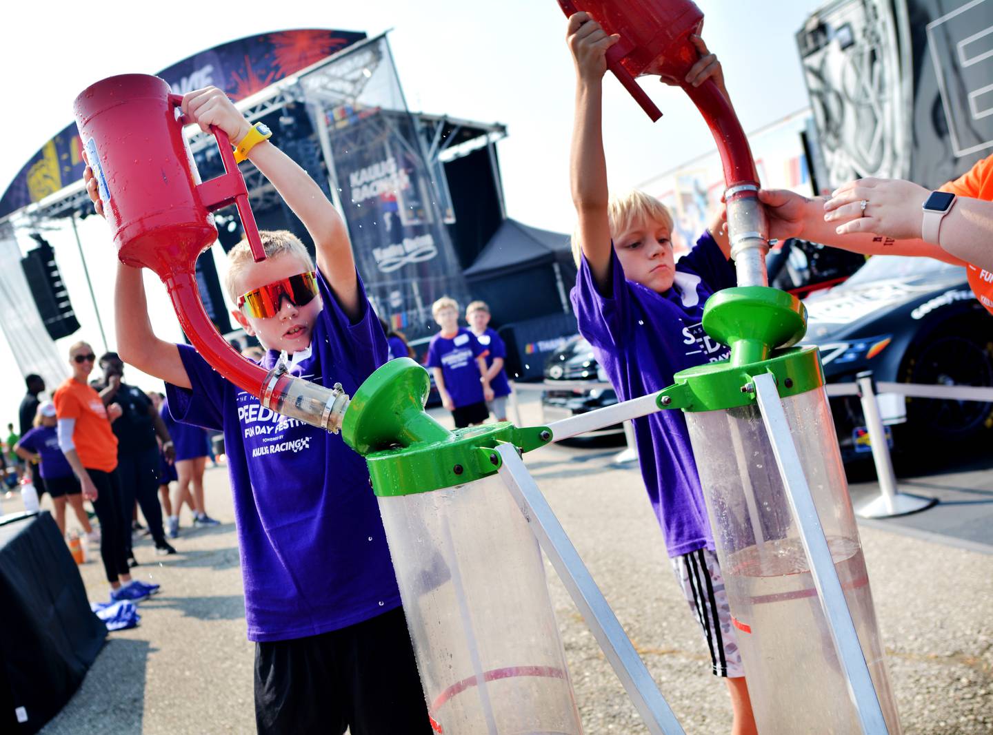 Newton YMCA campers participate in Speediatrics Fun Day Festival activities Friday, Aug. 1 at the Iowa Speedway during the NASCAR race weekend.