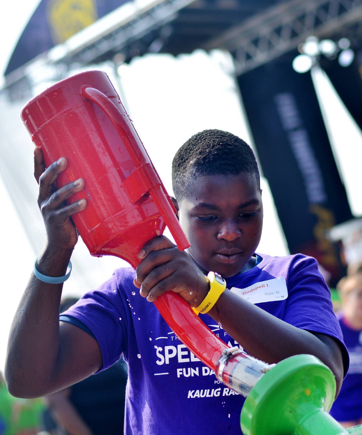 Newton YMCA campers participate in Speediatrics Fun Day Festival activities Friday, Aug. 1 at the Iowa Speedway during the NASCAR race weekend.