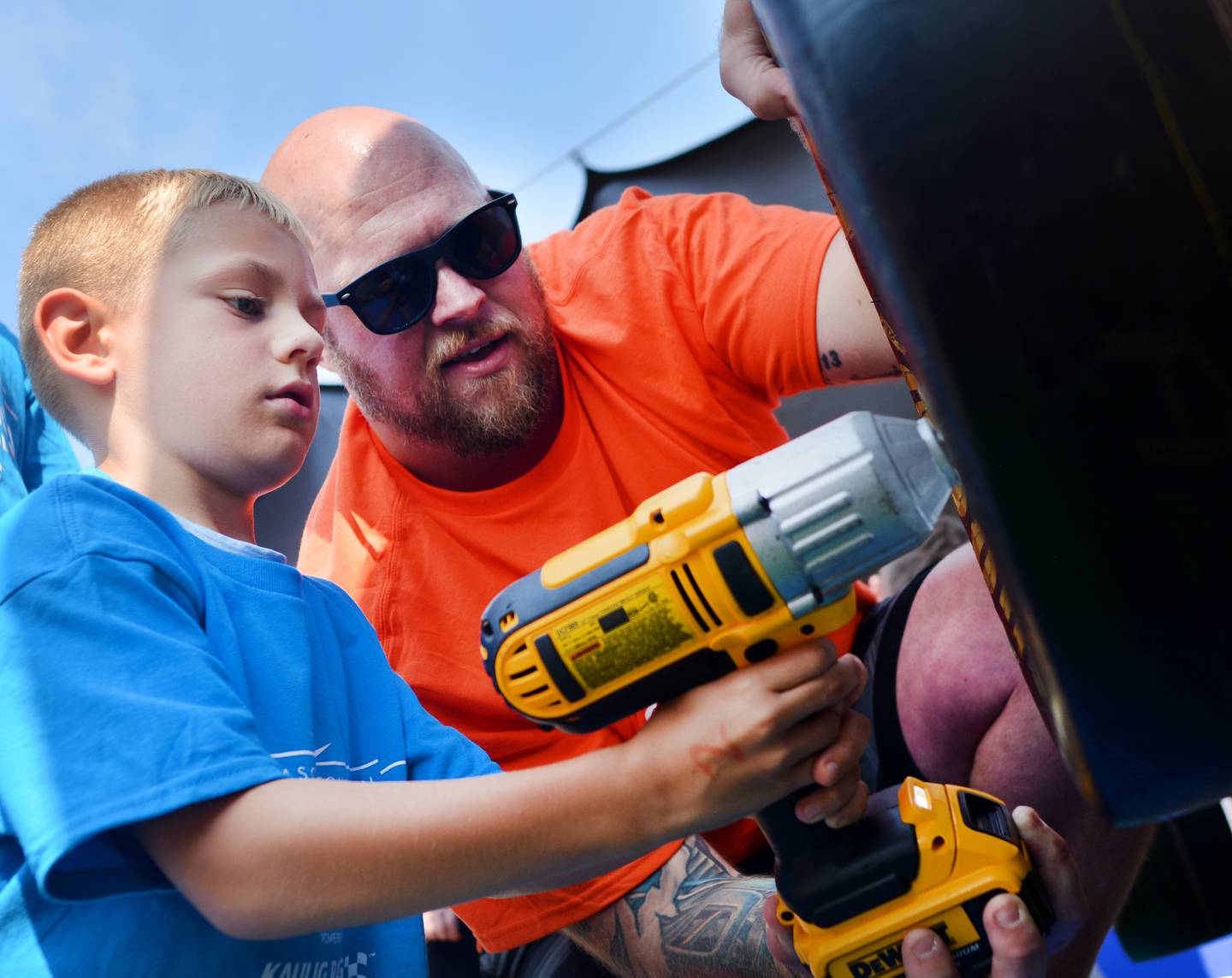 Newton YMCA campers participate in Speediatrics Fun Day Festival activities Friday, Aug. 1 at the Iowa Speedway during the NASCAR race weekend.