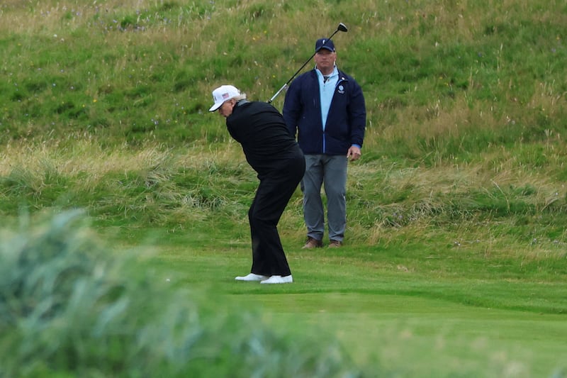 Trump plays golf on his Turnberry course in Scotland